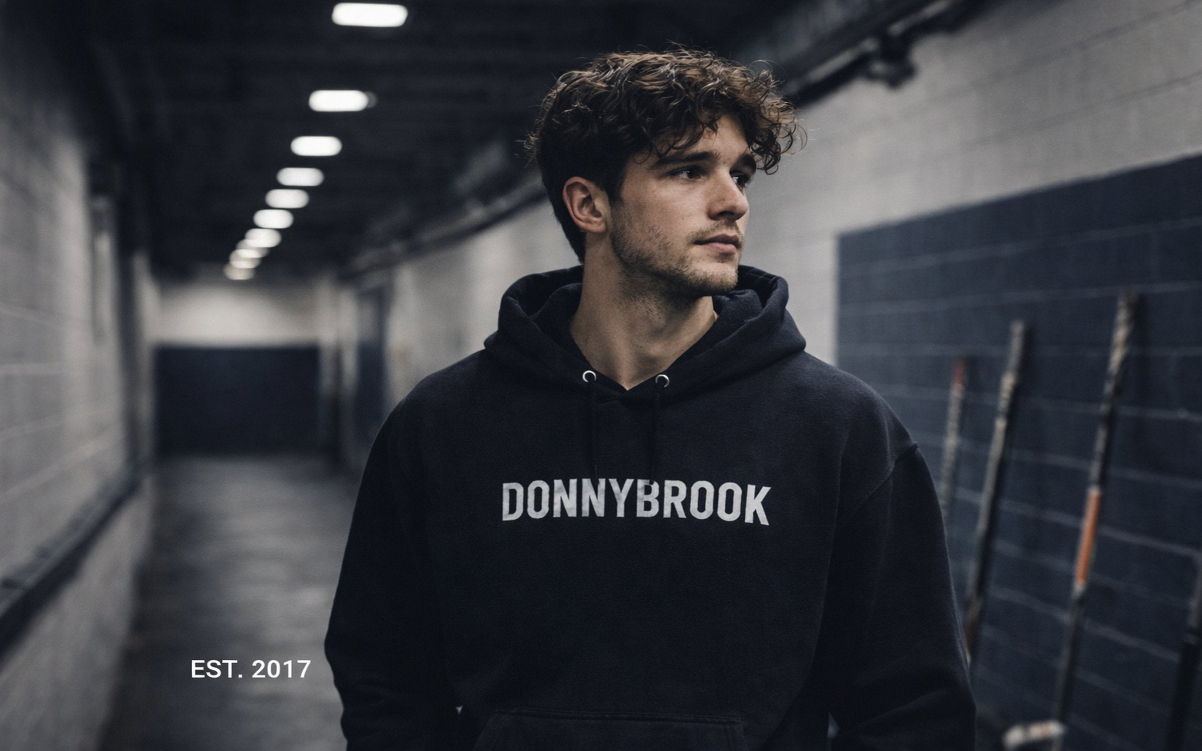 Donnybrook hoodie in the rink tunnel — est. 2017